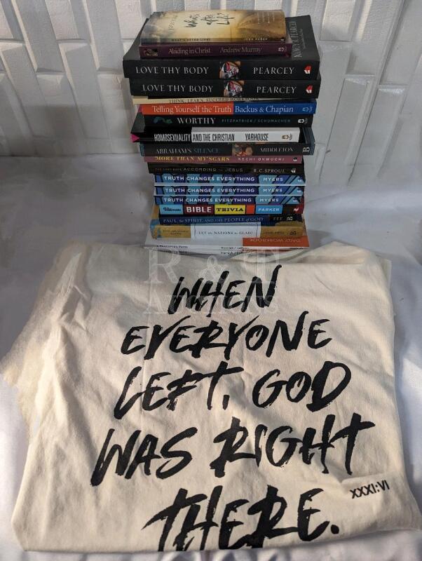 A large lot of Christian Books and a Christian T-shirt size Large