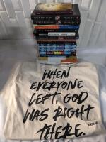 A large lot of Christian Books and a Christian T-shirt size Large