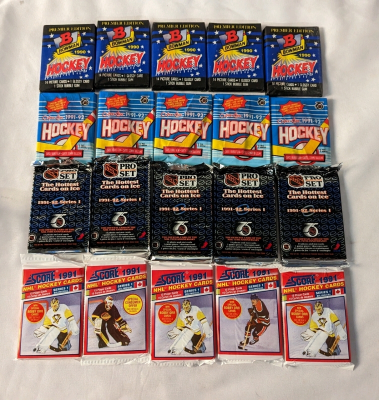 20 1990 + 1991 Sealed NHL Hockey Wax Packs.