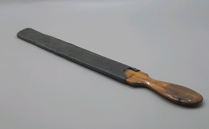 Antique Wooden Page Turner in Sheath 11"