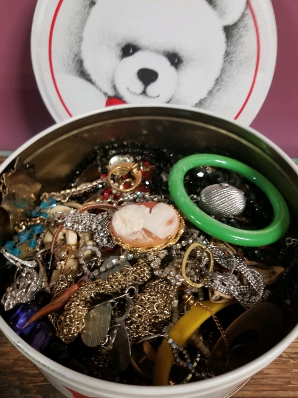 Cookie tin full of jewelry