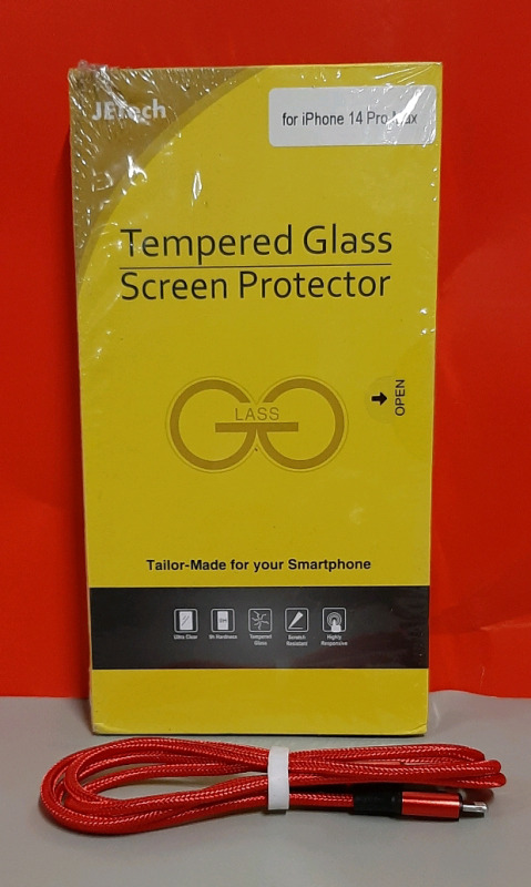 New Tempered Glass Screen Protector for an iPhone 14 Pro Max. Included is a charging cable