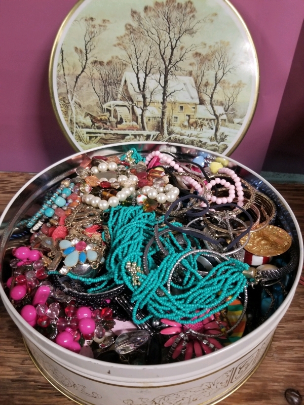 Vintage cookie tin full of jewelry