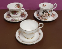 Vintage 3 Paragon Cups and Saucers. 1 Flower Festival 1 with a White and Gold Border 1 with Peach Flowers and Brown Berries