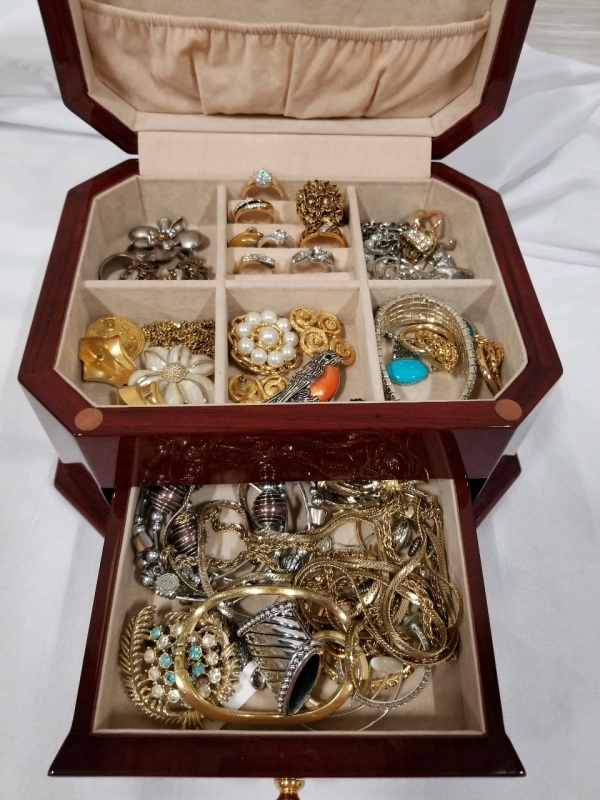 Beautiful wooden jewelry box with contents