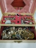 Vintage jewelry box with contents