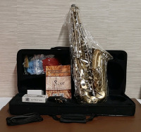 New in Original Packaging SladeAlto Sax. Comes with Reeds, Polishing Gloves, Strap and Case