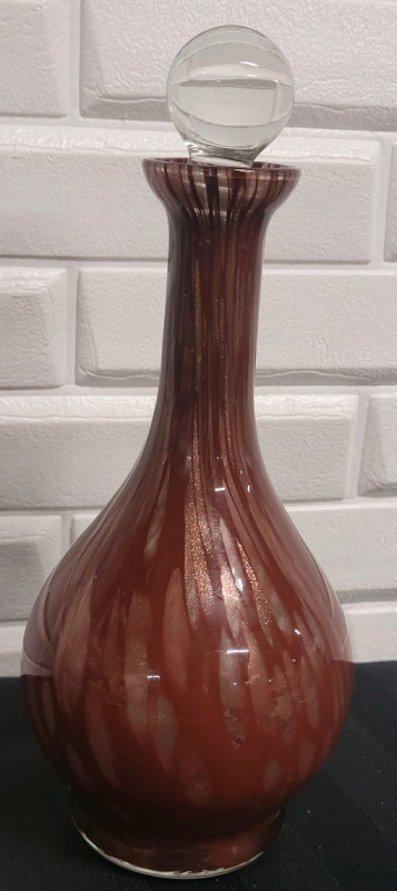 Art Glass Vase with Glass Stopper . Measures 9.5" tall . No chips or cracks to Vase