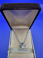 Sterling Silver 925 fancy 20 inch stamped chain holds a stemmed four leaf lucky clover. Four leaf etched clover is approximately .75 inches with back bale. Presented in a vintage People Jewellers Box.