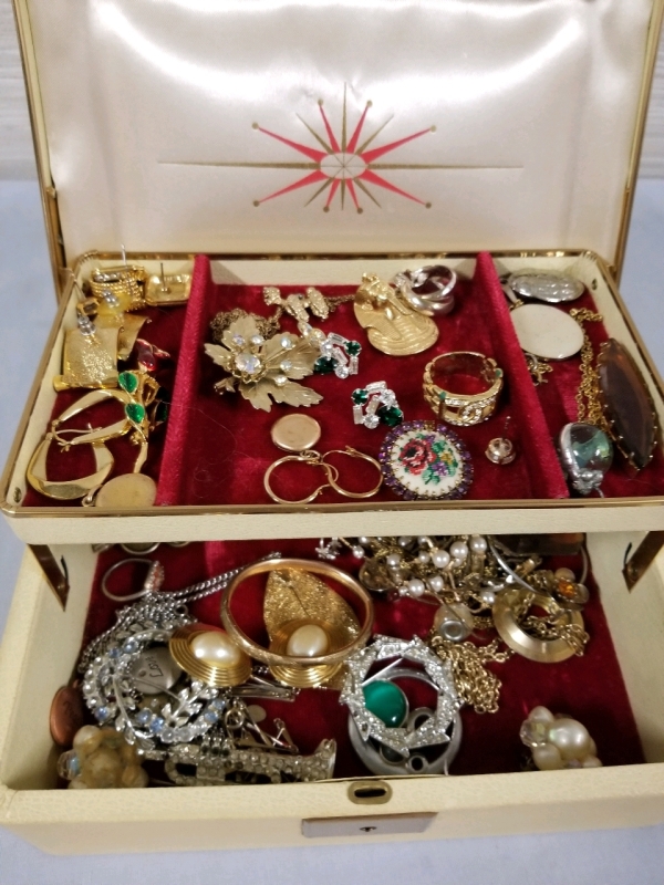 Vintage jewelry box with contents