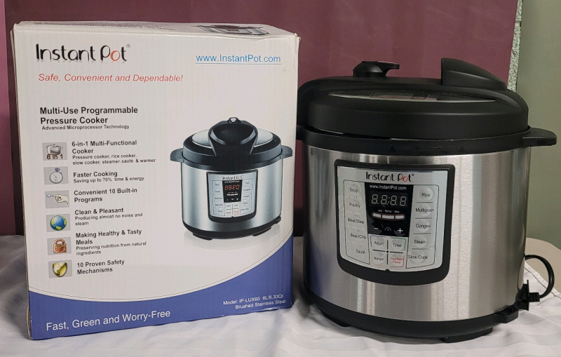 Instant Pot Multi-Use Programmable Pressure Cooker with Box . Tested Powers Up