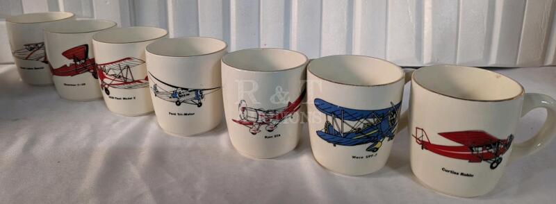 7 (Seven) Airplane Mugs.