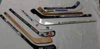 9 NHL Souvenir Hockey Sticks