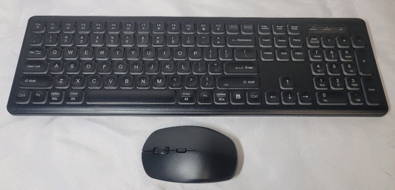 Wireless 104 Key Keyboard & Wireless Mouse . USB-C Charging Cord Not Included