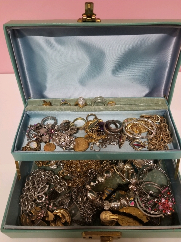 Vintage jewelry box with contents