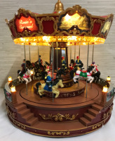 Musical Carousel 12 x 12 inches plays a selection of Christmas Songs & Lights Up working