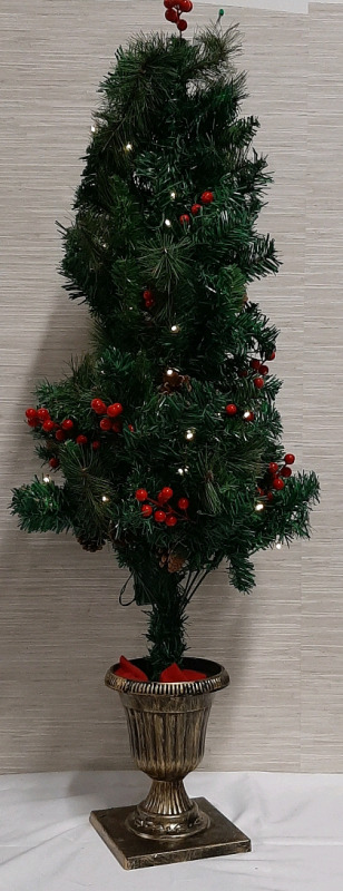 2 Four Foot Indoor or Oudoor Artificial Trees with Lights Will need to be shaped before use.