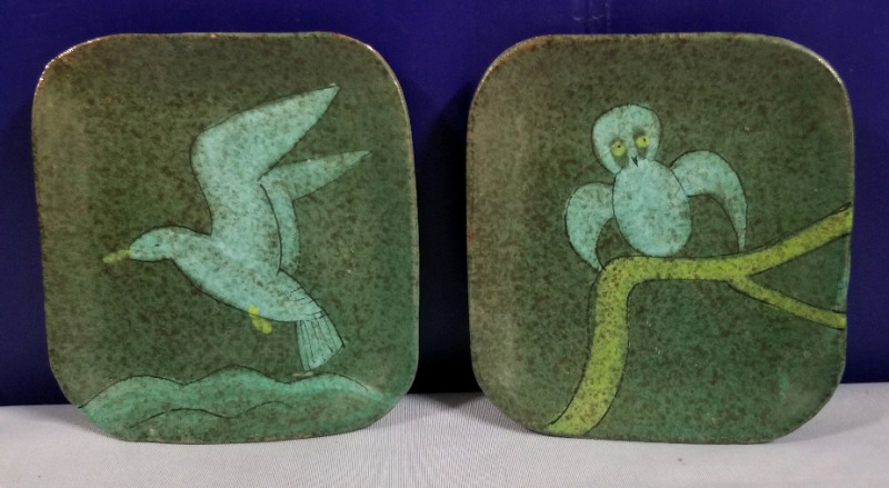 Pair of vintage signed enamel wall hangings