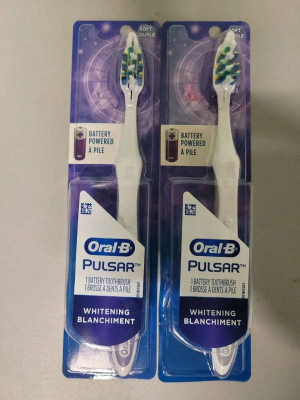 New - Oral-B Pulsar Battery Operated Toothbrush , Soft . Two (2) Toothbrushes