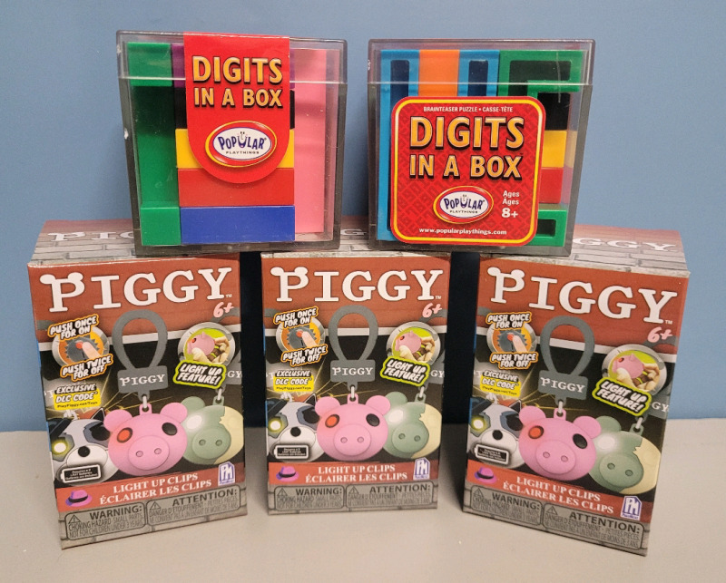 New - Piggy Light-Up Clips & Digits In A Box Puzzle