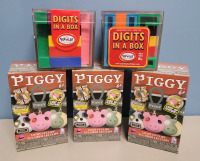 New - Piggy Light-Up Clips & Digits In A Box Puzzle