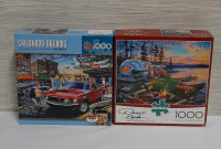 Two Jigsaw Puzzles Childhood Dreams is Sealed but Camping Reflections is not.