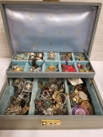 Vintage jewelry box with contents