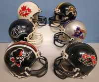 CFL Football East Team Mini Helmets by Riddel . Six (6) Helmets