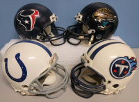 NFL Football AFC South Team Mini Helmets by Riddel . Four (4) Helmets
