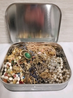 Cookie tin full of vintage to modern jewelry