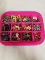 Plastic storage container of vintage to modern jewelry