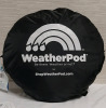 Weather Pod Stay Warm and Dry Anywhere Just by Taking Mere Moment to Open this Up. Light and Easy to Carry and Store Stock photo used