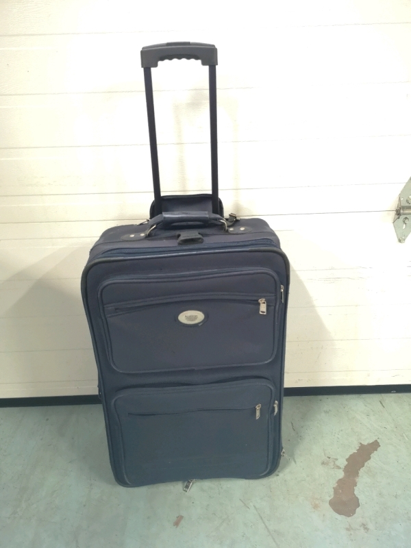 American Tourister Suitcase on Wheels