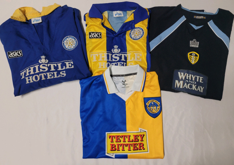 LEEDS United FC Away Football Jerseys . Four (4) Jerseys . Pre-owned