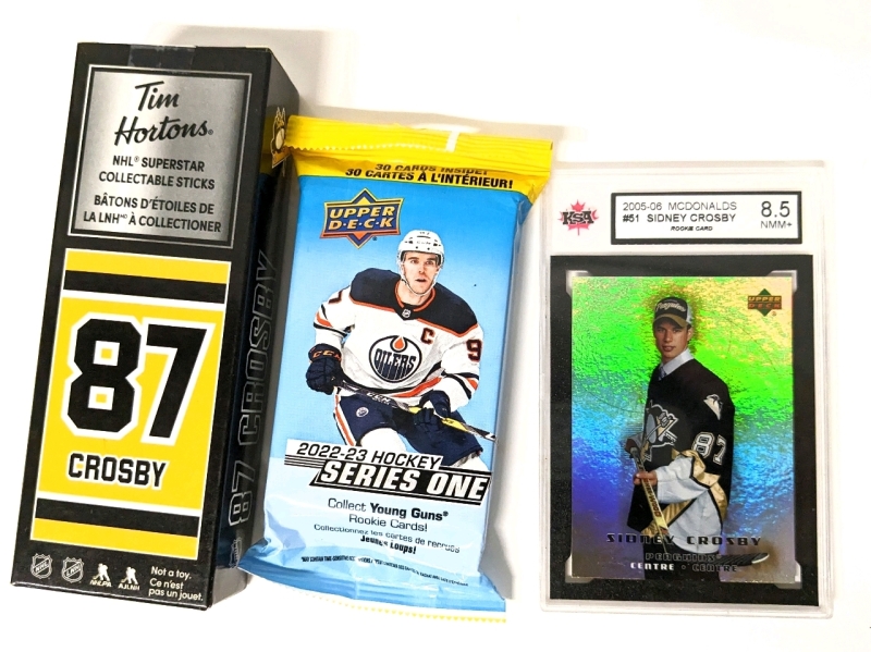 Graded 8.5 NMM+ Upper Deck 2005-2006 McDonald's #51 Sidney Crosby Rookie Card, #87 Crosby NHL Tim Hortons Mini Hockey Stick & Sealed Upper Deck 2022-2023 Hockey Series One Cards (30 Cards Inside)