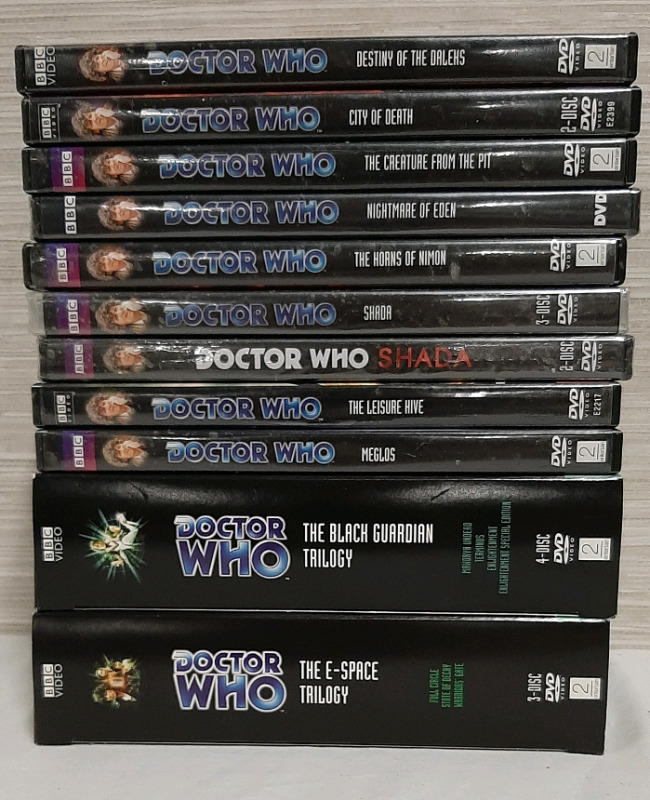 A Selection of Doctor Who DVDs with Tom Baker Three are new and included are Triology Sets One is with Tom Baker and the other is with Peter Davidson