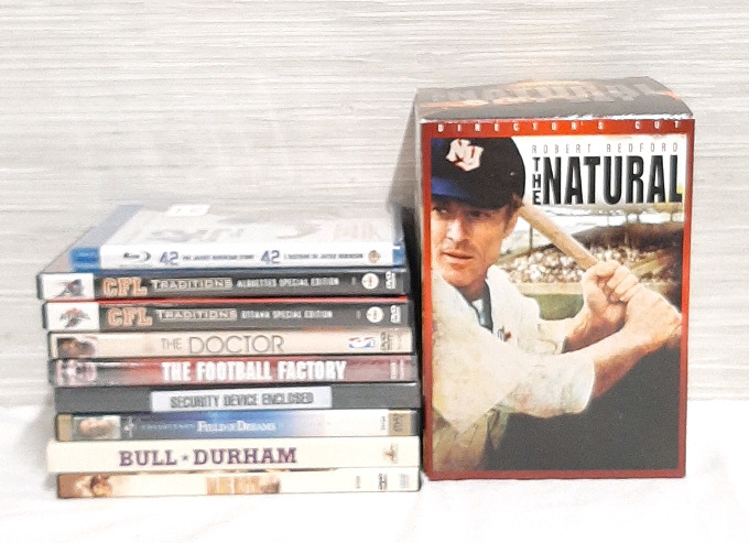 Nine Sports DVDs of all kinds Some are fiction, some historical Two are new Included is a Box with the Directors Cut of The Natural.