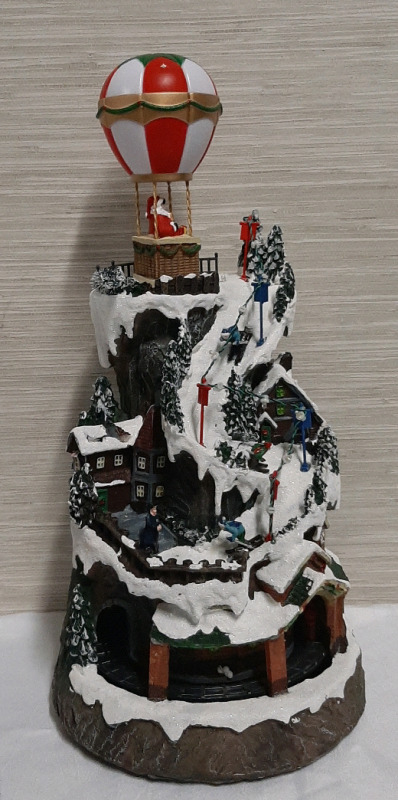 NEW WONDER GARDEN Christmas Village House-Christmas Houses Village - Colorful Musical Collectible Buildings with Rotating Hot Air Balloon & Rotating Train and LED Lights for Home Decor or Gift Takes 3 AAA batteries