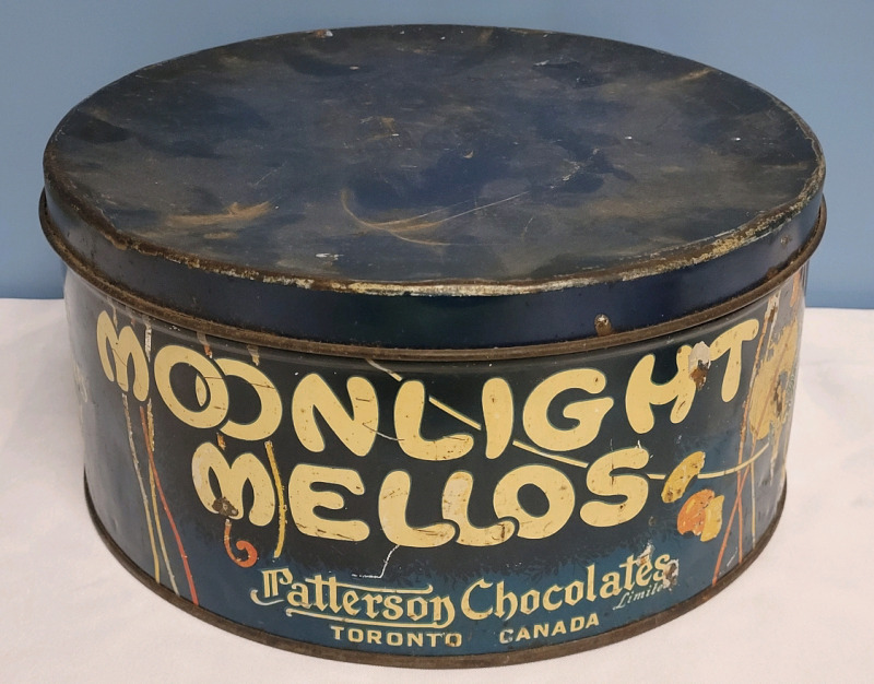 Vintage Patterson Chocolates MOONLIGHT MELLOS Candy Tin . Measures 10 3/4"×5"