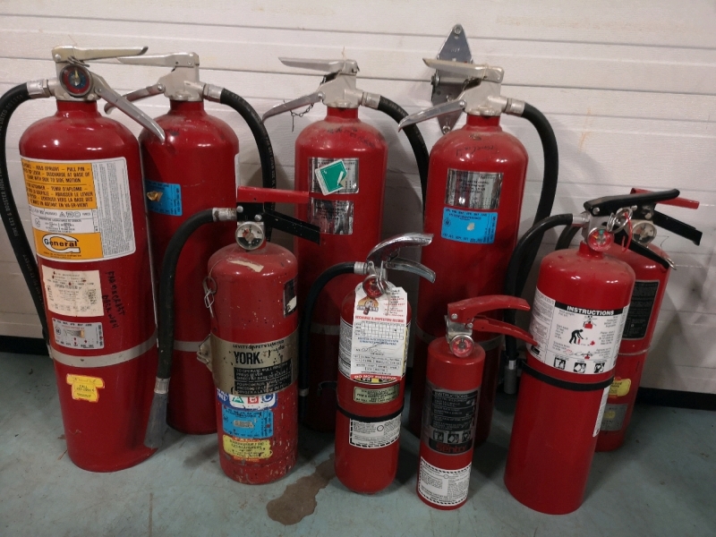 9 Fire Extinguishers - AS IS