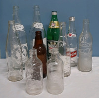 Vintage A Collection of Bottles from Pop World Pepsi Niagara Dry and others