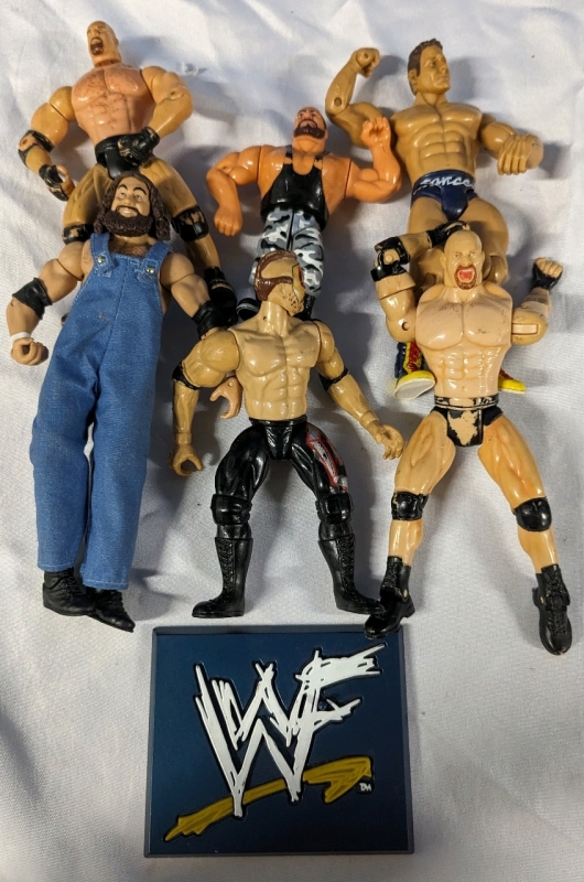 6 Assorted Wrestling Figures + WWF Stand