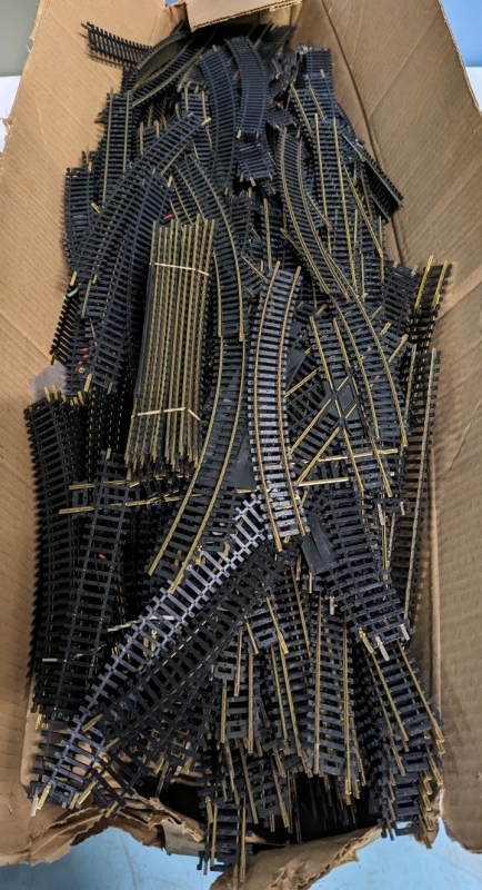 100+ Peices of Assorted Train Tracks