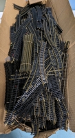 100+ Peices of Assorted Train Tracks