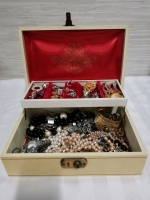 Vintage jewelry box with contents