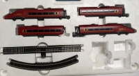 4 Lima Model Trains and 12 Peices of Track.