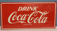 Coca-Cola Tin Sign , measures 24"&times;12" . Some minor scuff marks