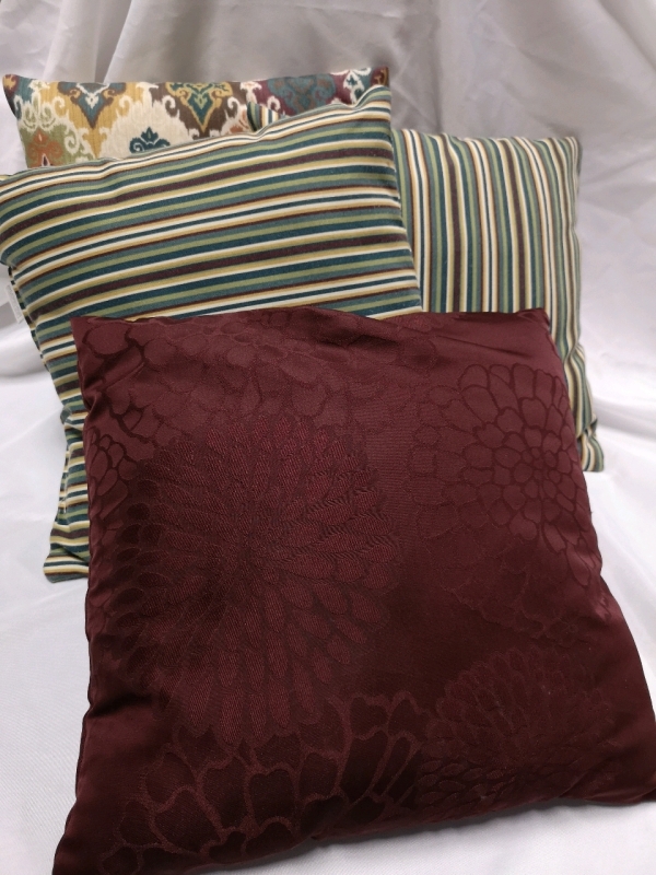 4 Decorative Pillows - 16 by 16"