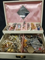 Vintage jewelry box with contents