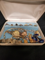 Vintage jewelry box with contents. Box measures approximately